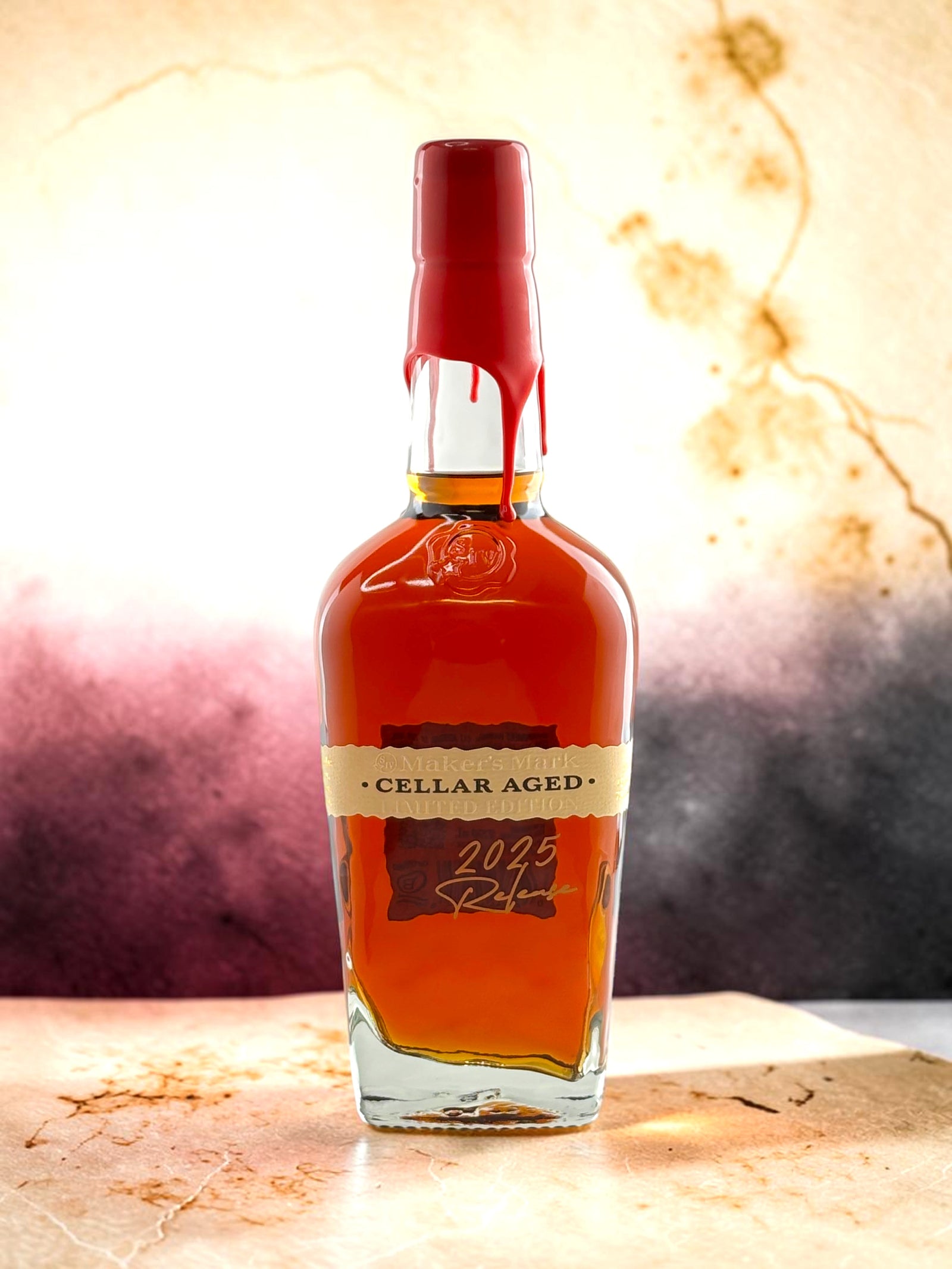 Primary
Maker's Mark Cellar Aged 2025 limited edition bourbon bottle with signature red wax seal, front view.